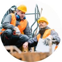 Managers reviewing work on site
