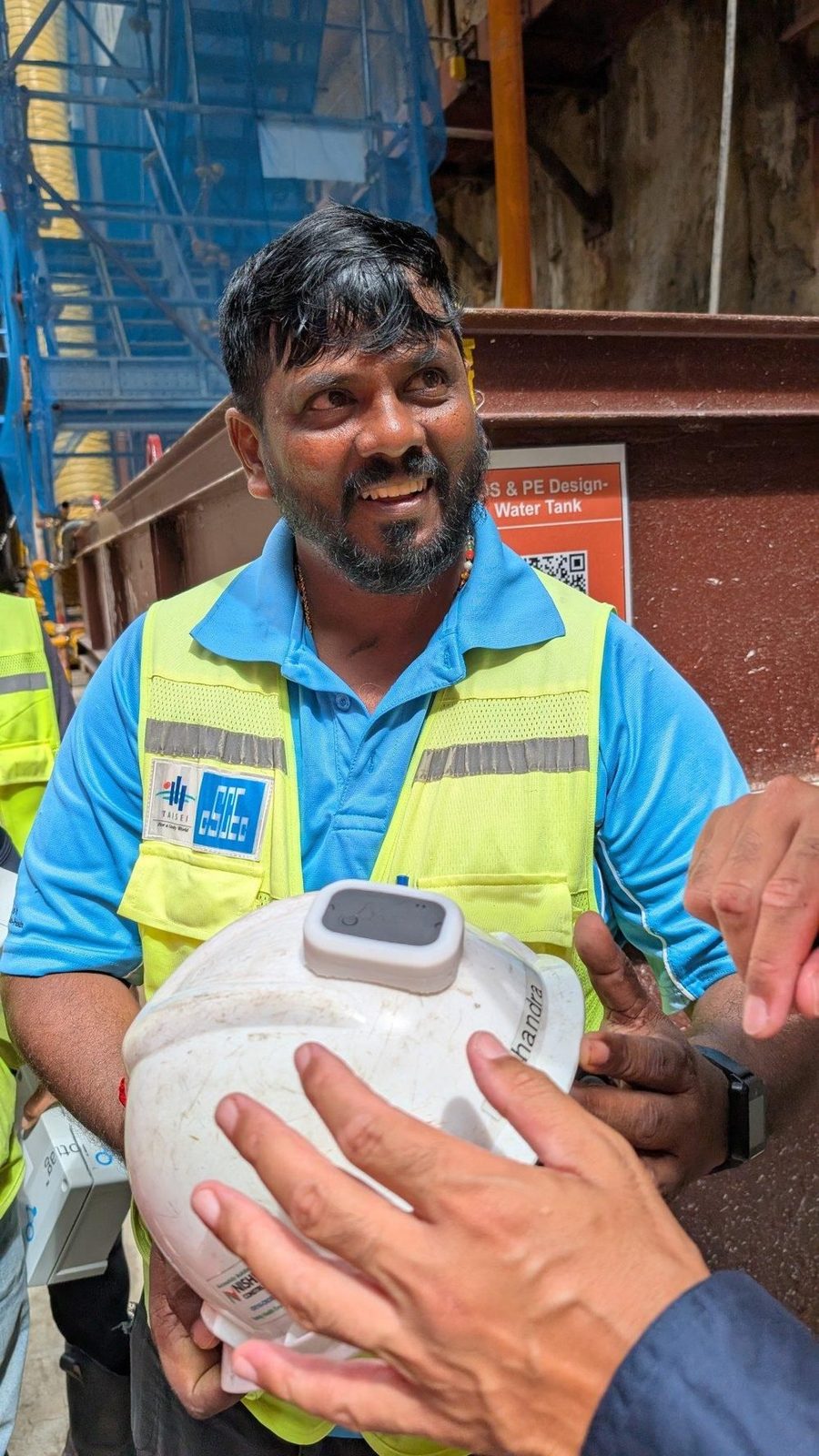 Worker wearing the Vector Tag in an underground operational environment